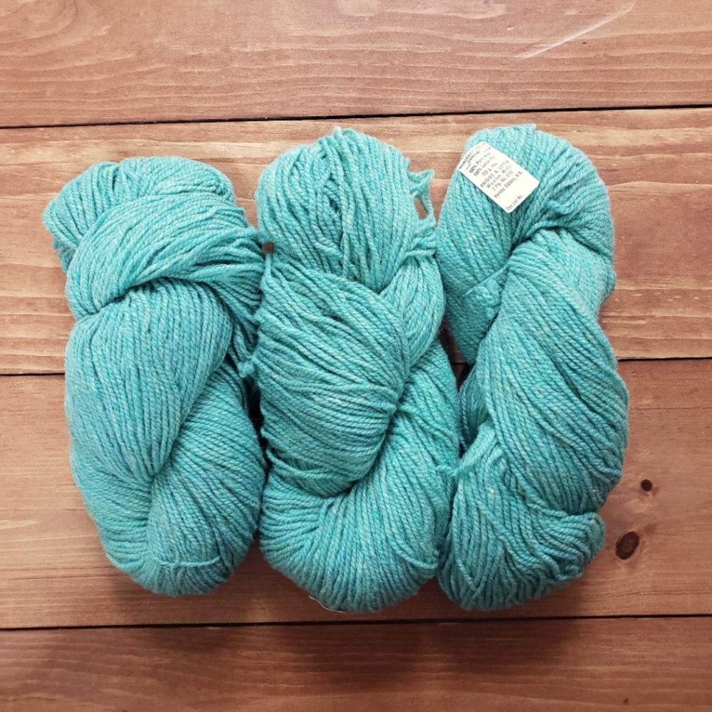 7 skeins of 100% pure wool worsted weight yarn blue